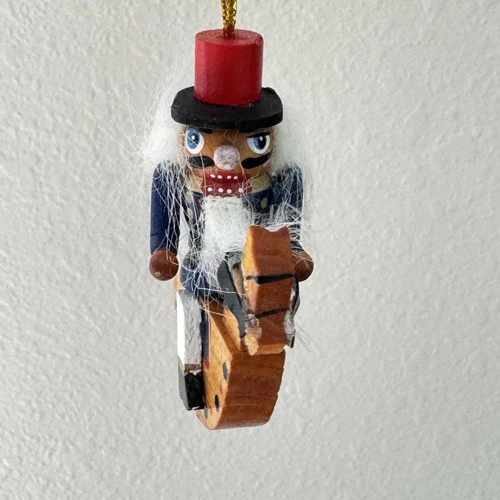 Vintage Nutcracker Christmas Ornament Riding on Rocking Horse Wooden Kitsch